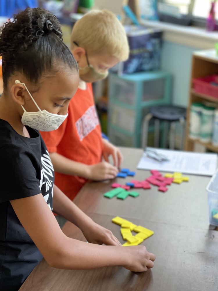 Students working together at GES