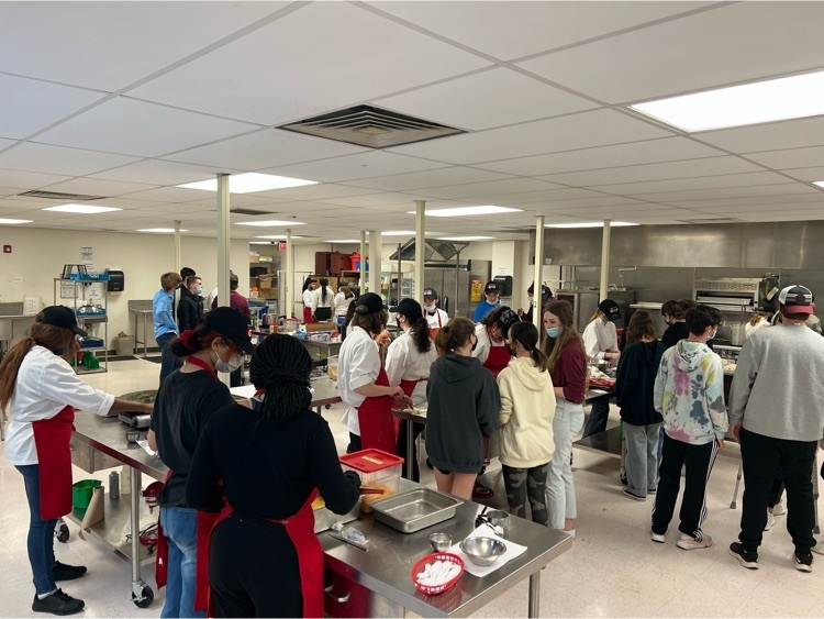 full kitchen of History and Culinary Arts students